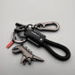 Dije de dinosaurio de aleación de aluminio combinado con una pulsera tejida a mano - 🔥Segundo artículo con un 40 % de descuento
