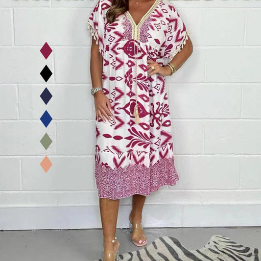 ⏰Compra 2 y Recibe Envío Gratis🔥 Elegante y chic vestido con escote en V estampado y adornos de borlas.
