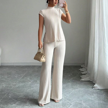 📢⏰ Conjunto de dos piezas compuesto por un elegante top de cuello alto y unos pantalones de pierna ancha