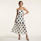 Elegante vestido de tirantes de lunares y escaleras
