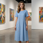 Vestido midi informal de mujer con botones irregulares