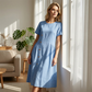 Vestido midi informal de mujer con botones irregulares