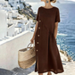 Vestido midi informal de mujer con botones irregulares