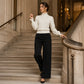 Top de punto elegante y acogedor para mujer con volantes